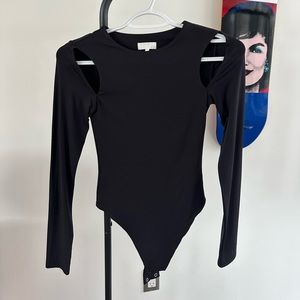 Meshki XXS black cutout detail long sleeve bodysuit.